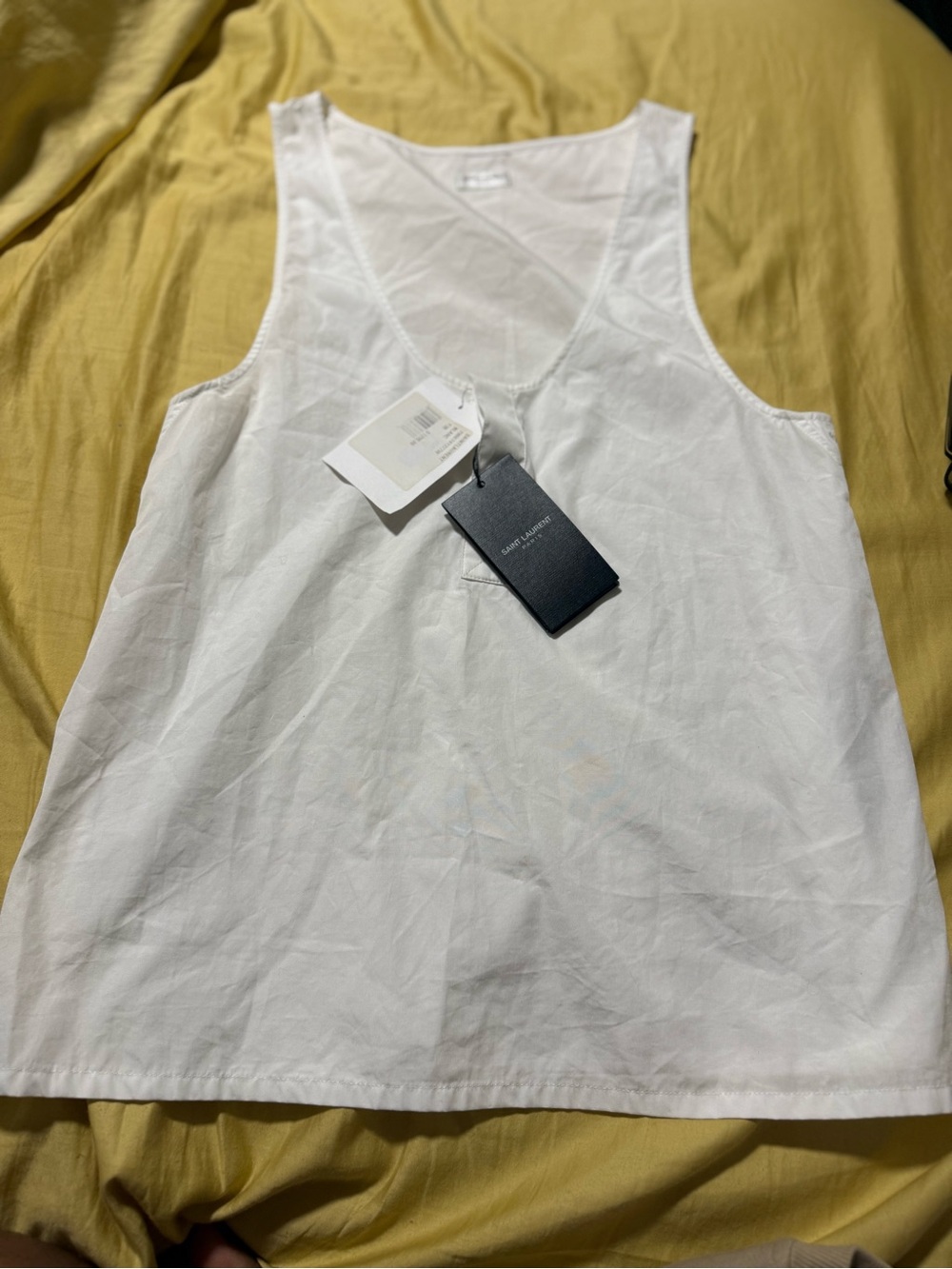 Yves Saint Laurent Black Logo Hang Tag on White Garment